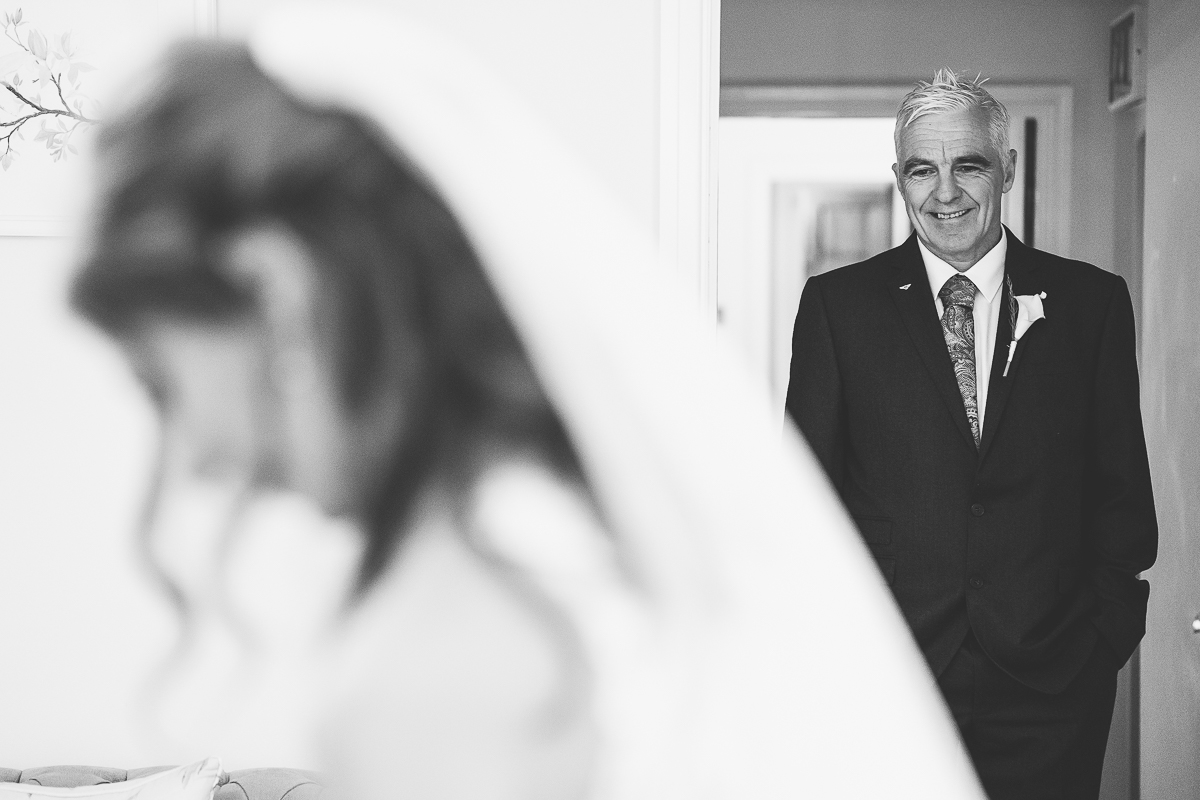 Father of the bride looking at his daughter