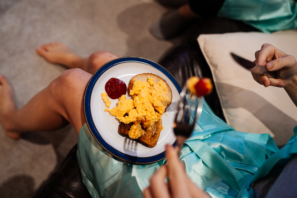 bridesmaid eating scrambled eggs
